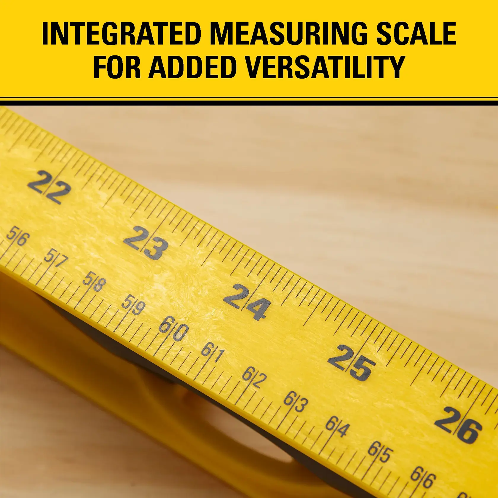 Close-up of a yellow STANLEY measuring tool with integrated measuring scale, showing numbers and markings. The background includes a wooden surface and a banner at the top reads 'Integrated measuring scale for added versatility.'