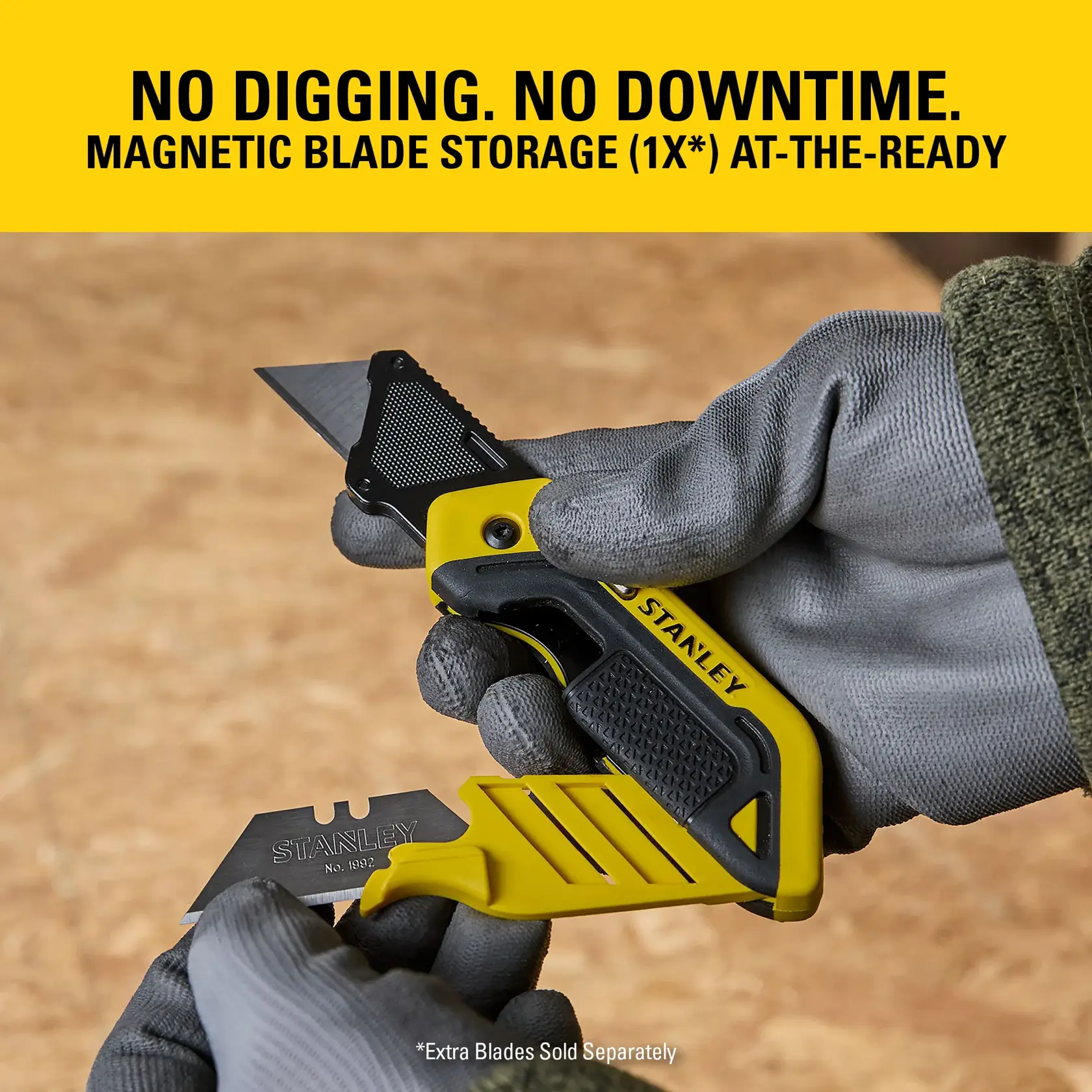 Stanley utility knife with magnetic blade storage, shown held in gloved hands and an extra blade.