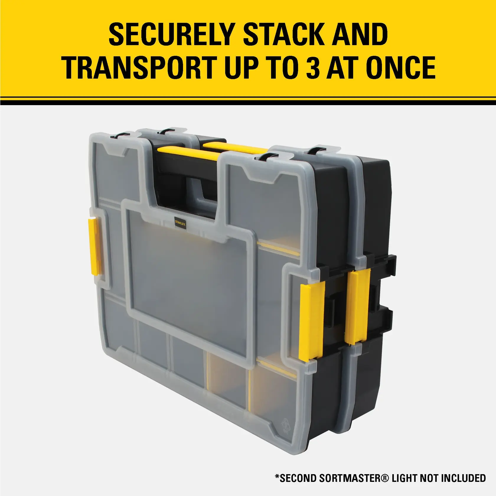 A Stanley SortMaster storage case with yellow and gray accents, shown stacked and ready to transport, illustrating that up to three cases can be securely stacked and carried at once. The text notes that a second SortMaster light is not included.