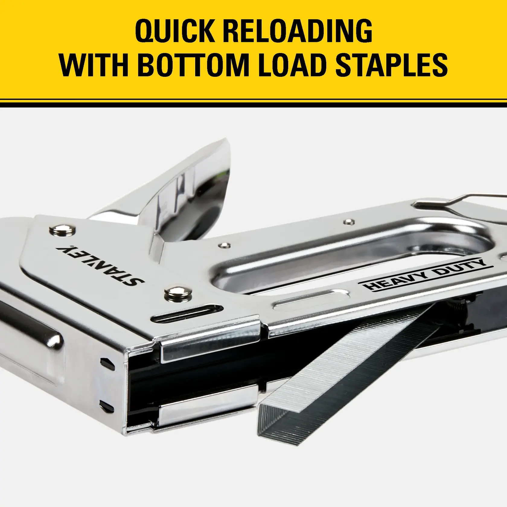 Close-up image of a Stanley TR110 heavy duty staple gun, showing the bottom loading feature with a strip of staples partially inserted. The text above reads 'Quick reloading with bottom load staples.'
